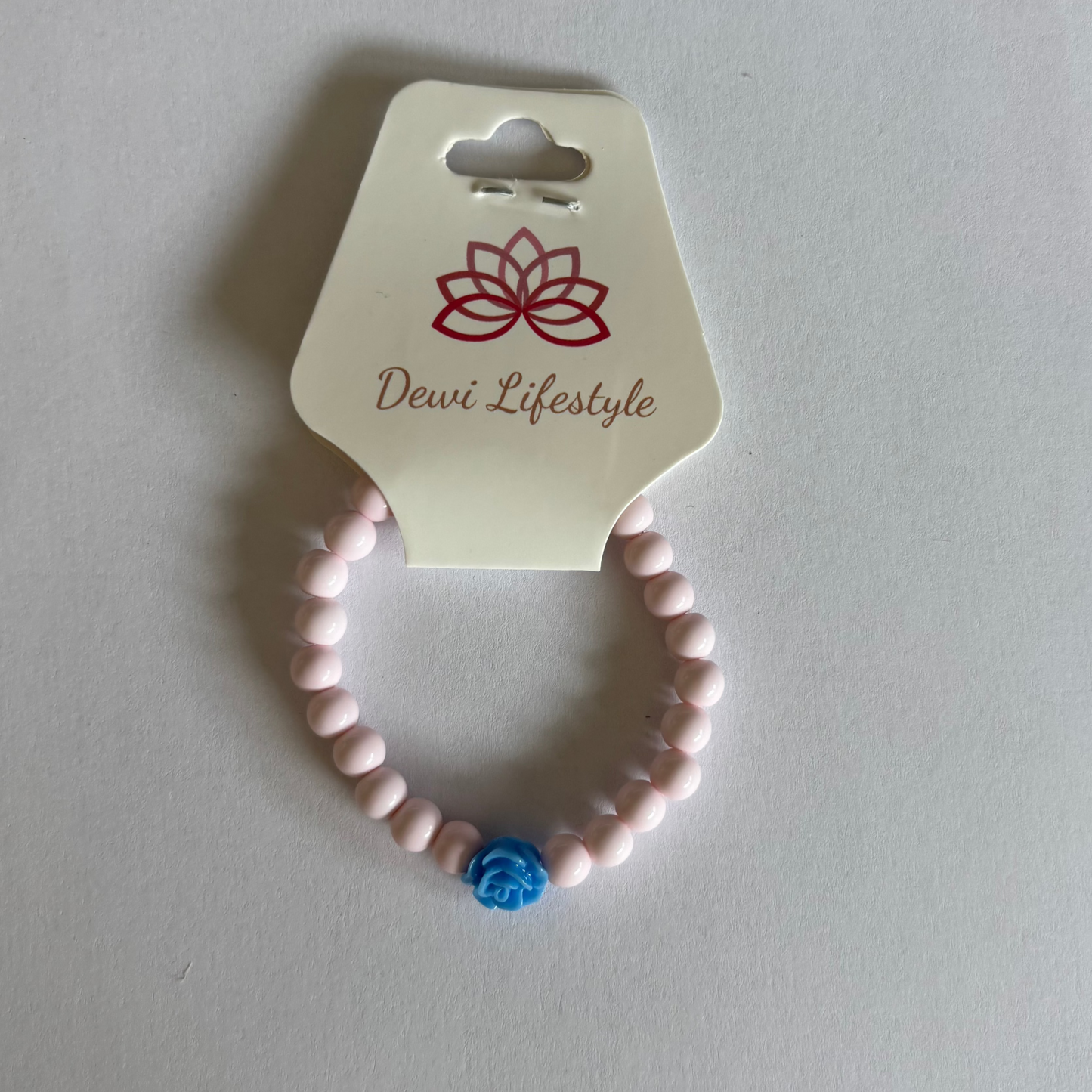 Dewi lifestyle : armband kids flower - licht roze met blauw roosje