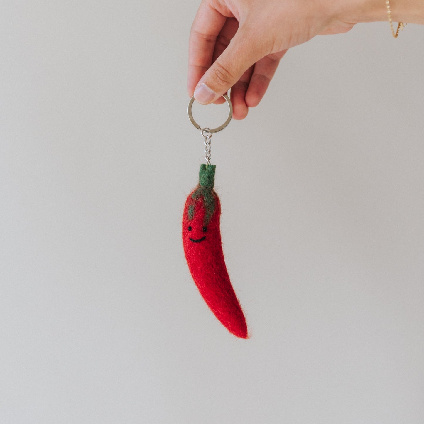 Person ' Elle : sleutelhanger - rode peper
