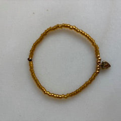 Lief label : armband op rek - goudkleurig met gouden hartje